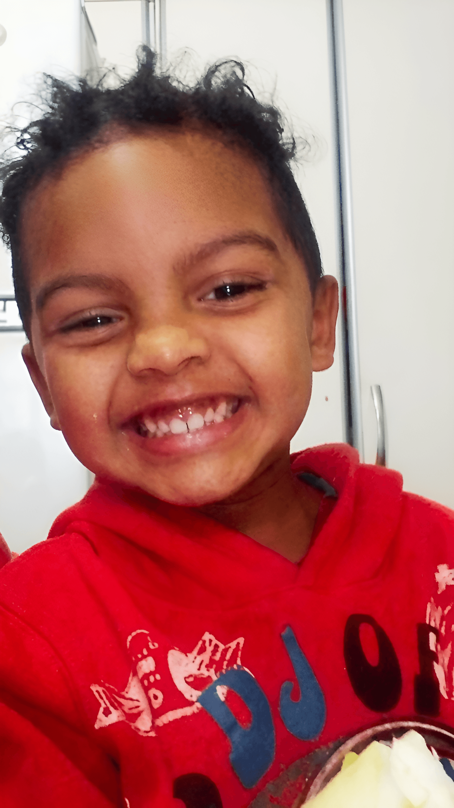 Sharpen Blurry Child Photos with AI | BgRemovit Image Enhancer