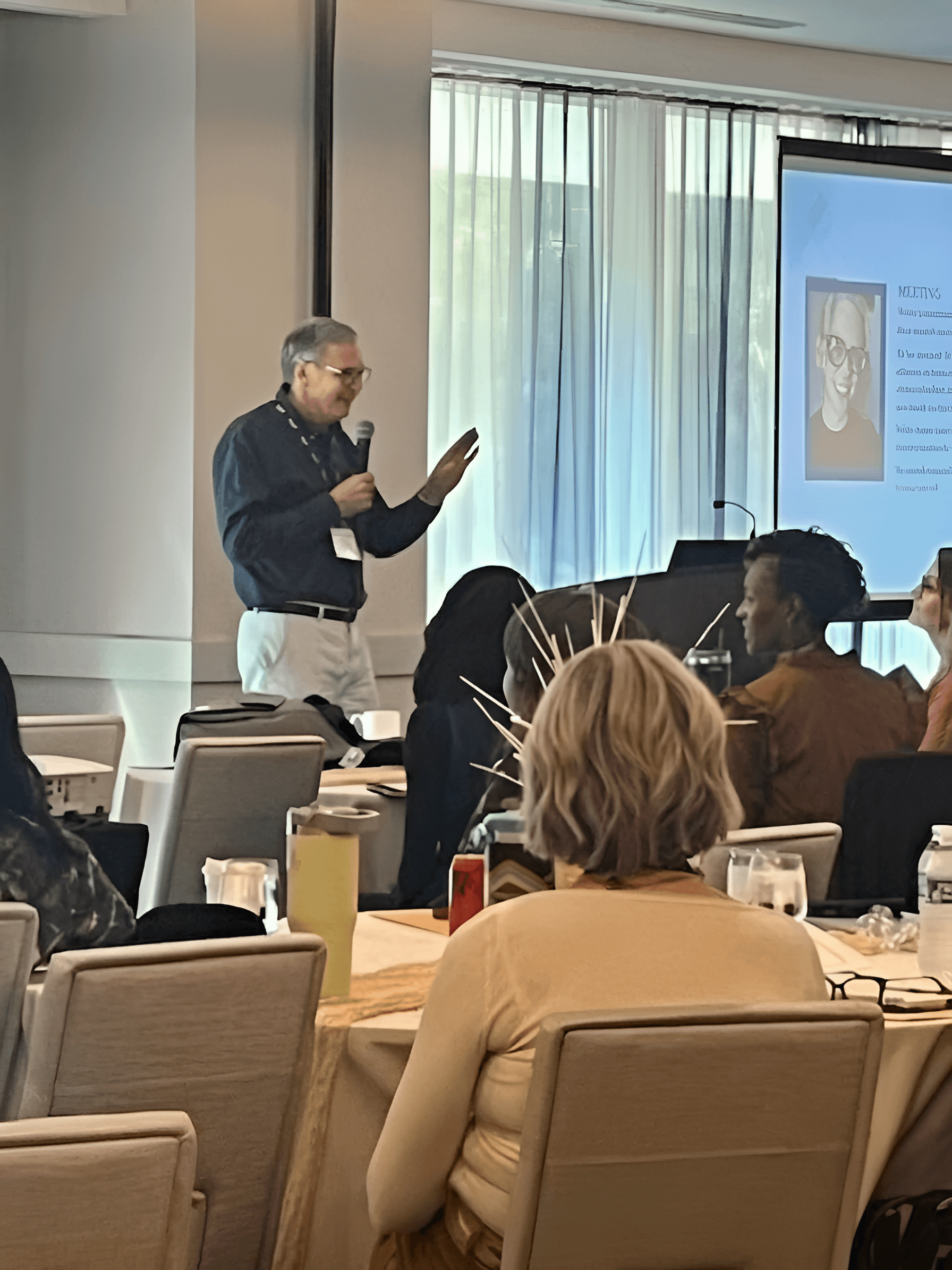 Sharpen Conference Speaker Photo | AI Image Enhancer