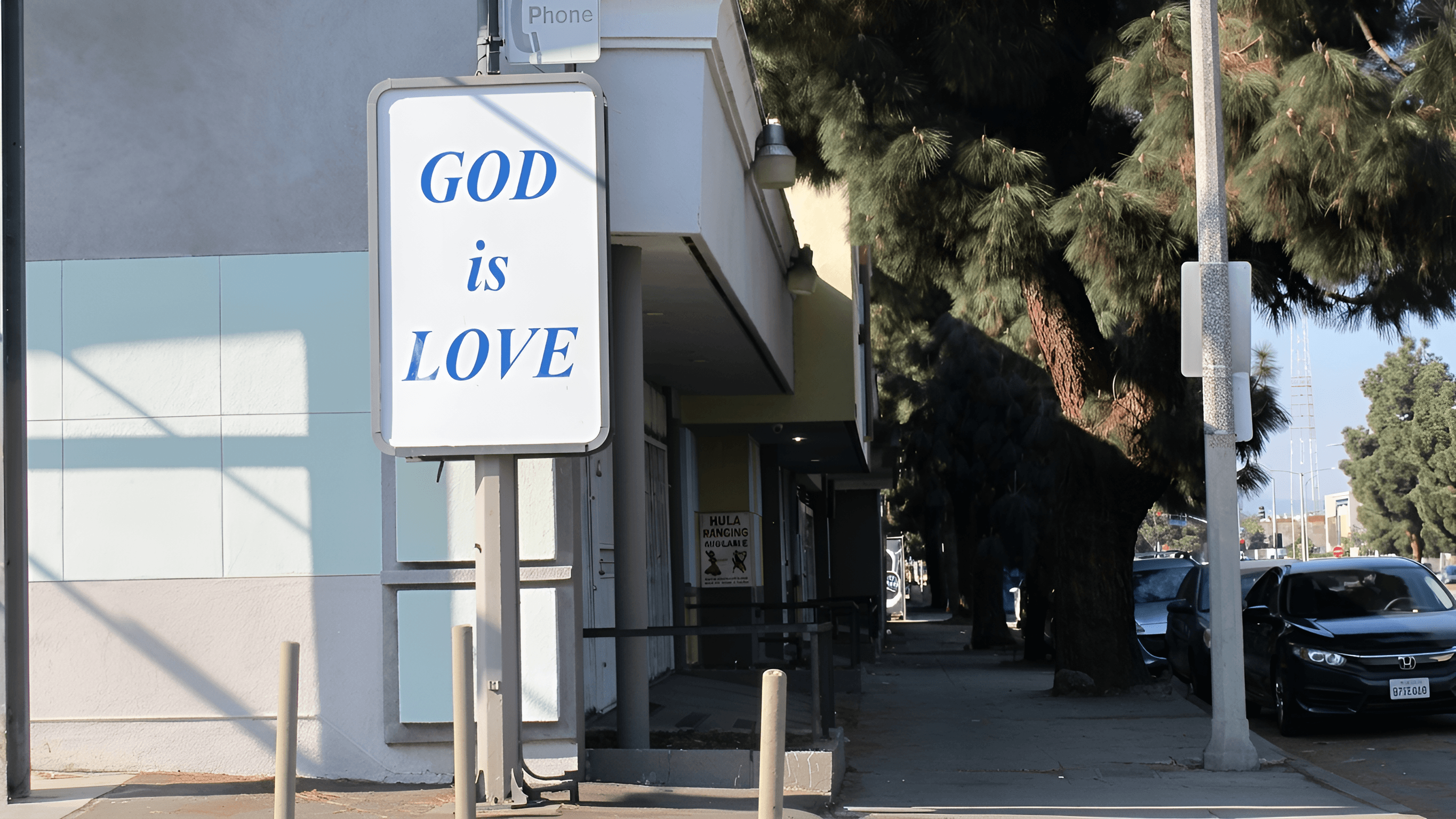 Enhance 'God is Love' Sign Photo | AI Image Upscaler