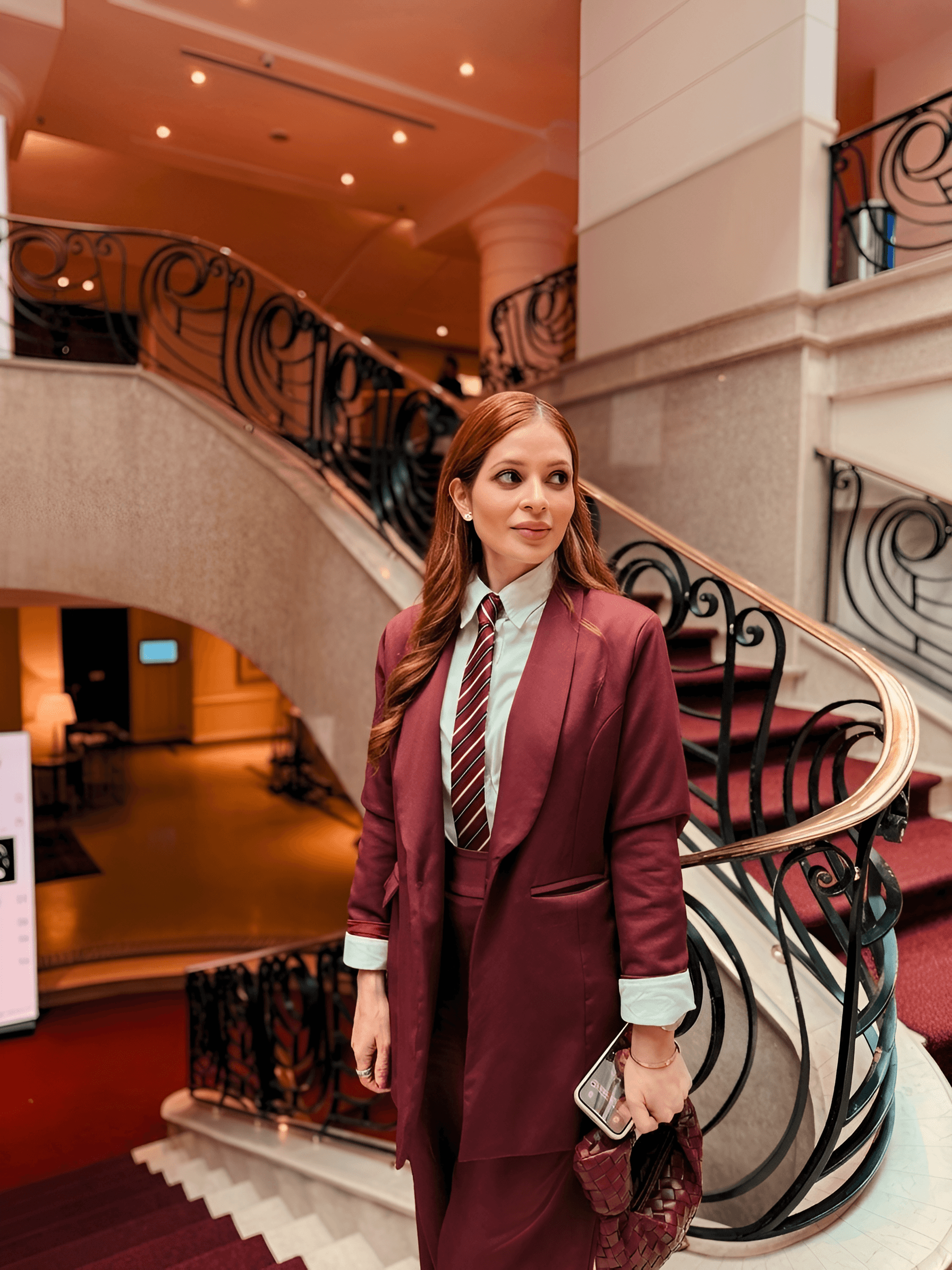 AI Image Enhancer: Sharpen Professional Suit Photo on Grand Staircase