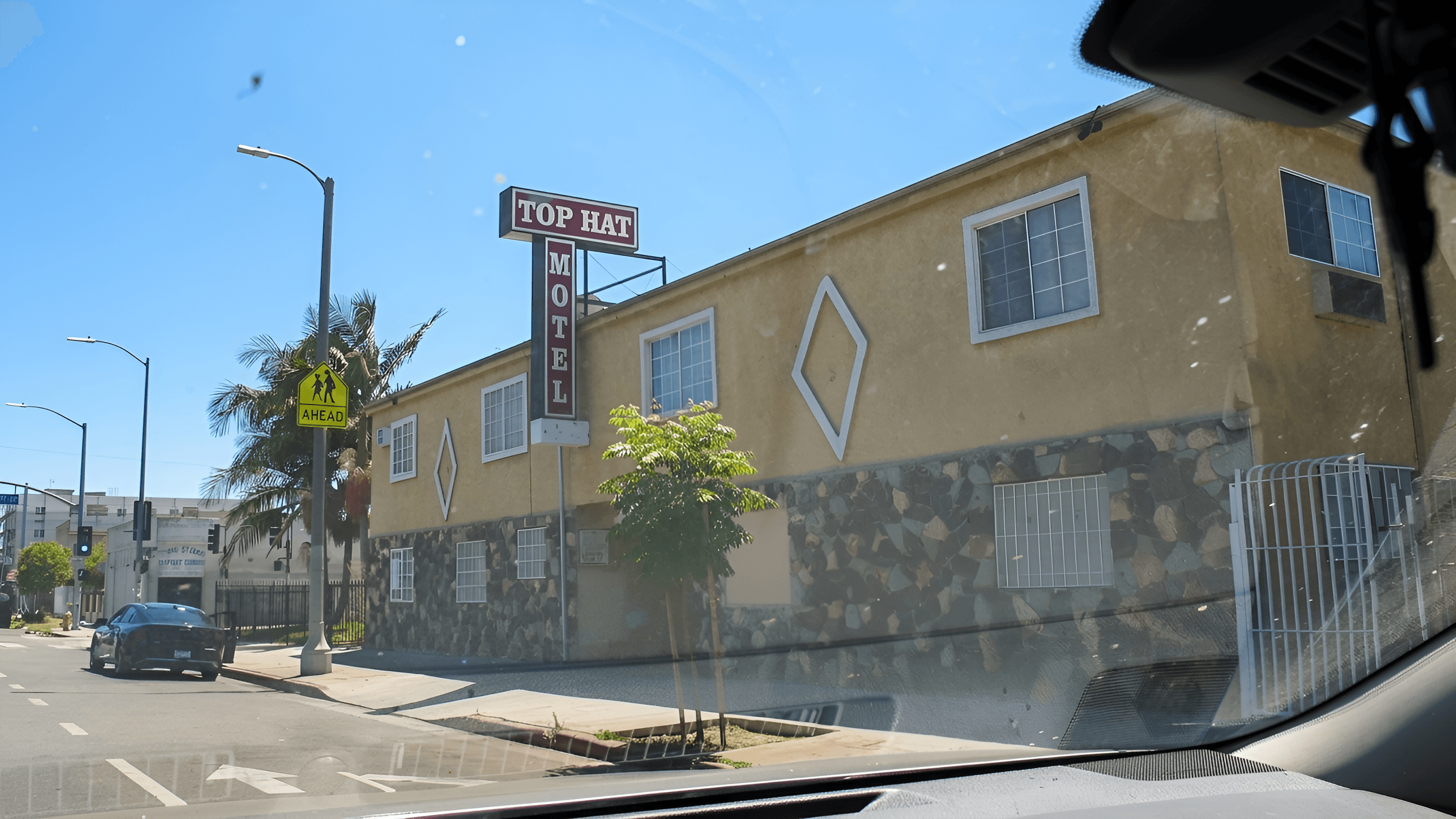 AI Upscales Top Hat Motel Photo | Sharpen Street View
