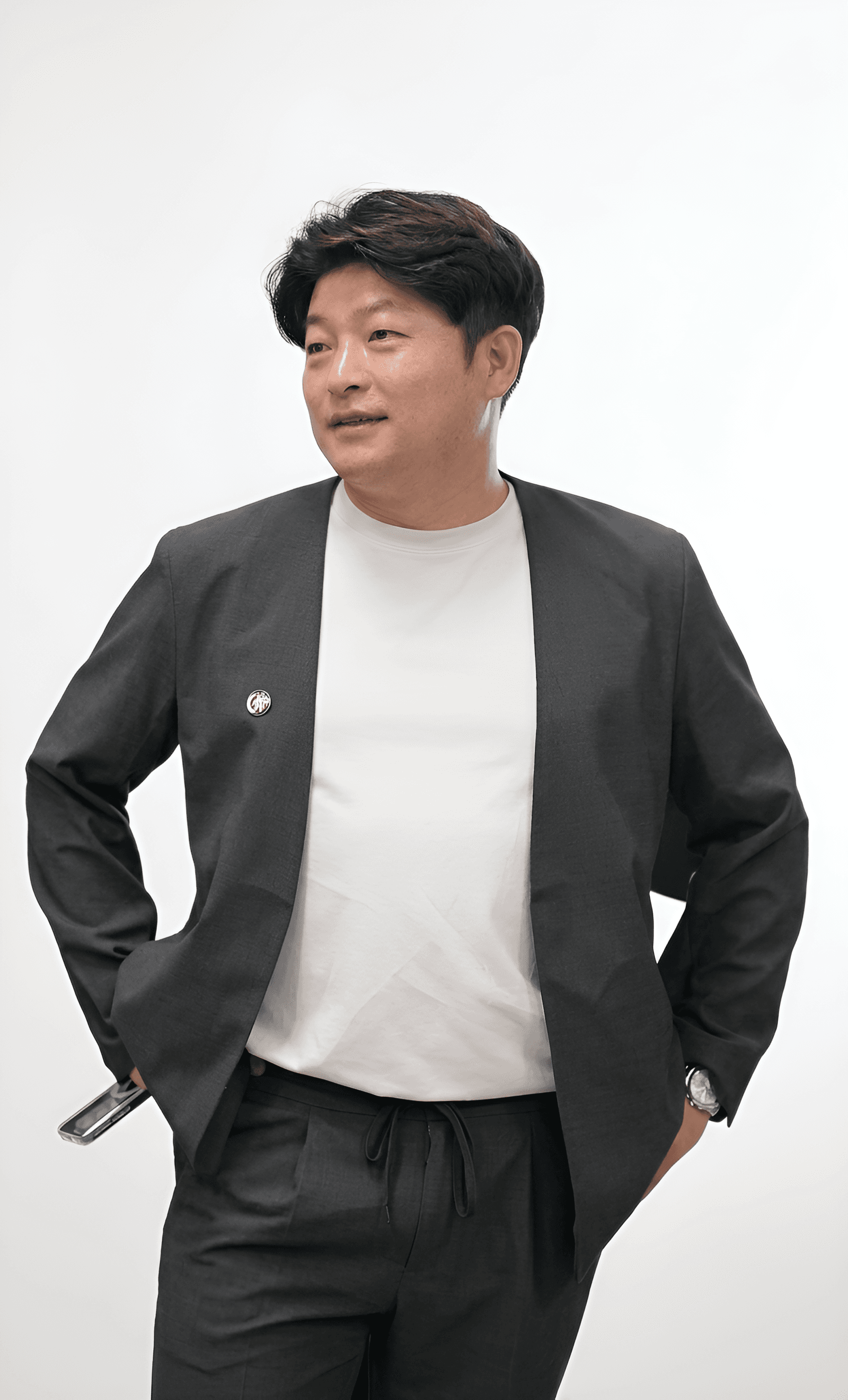 AI Upscaling: Man's Suit & Portrait Detail Enhanced | BgRemovit