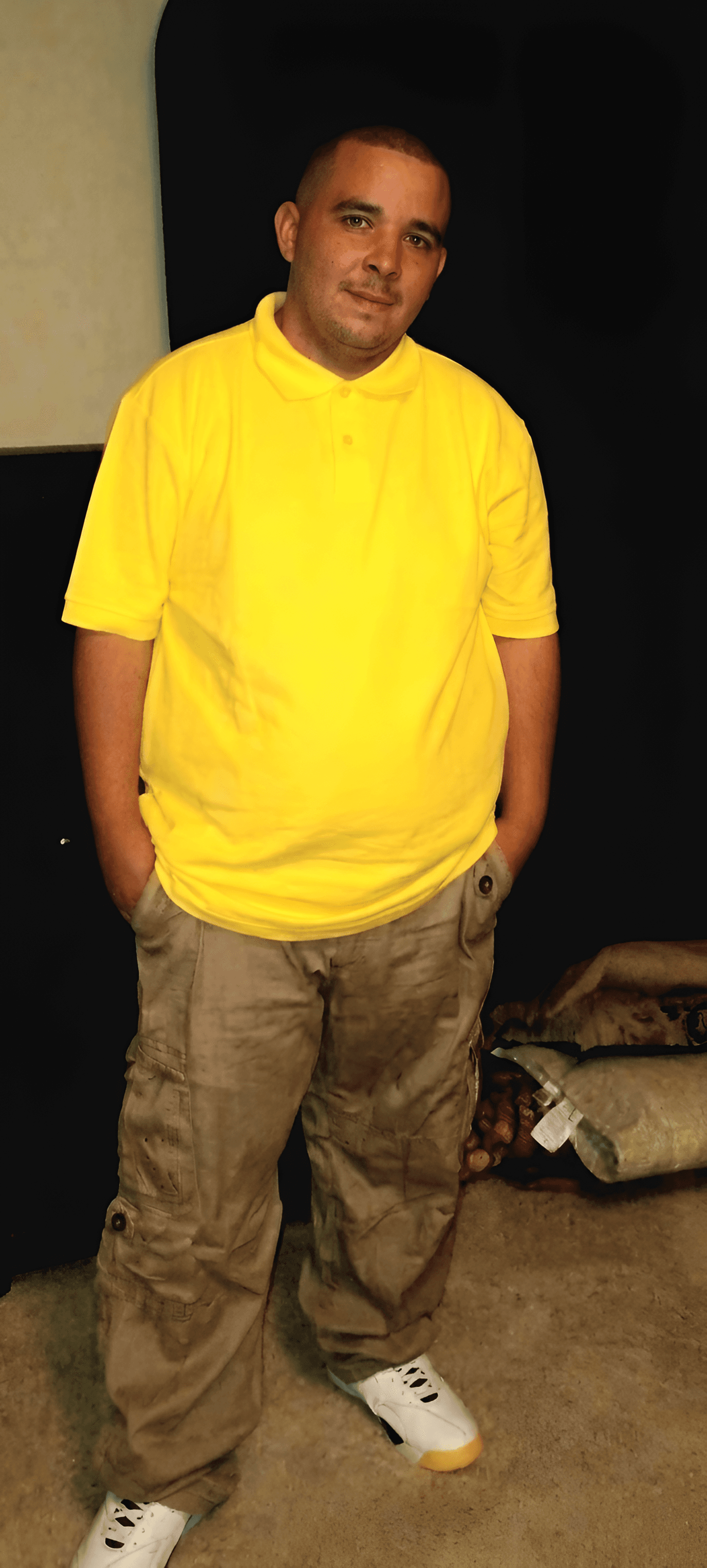 AI Image Enhancer: Upscale Low-Res Photo of Man in Yellow Shirt