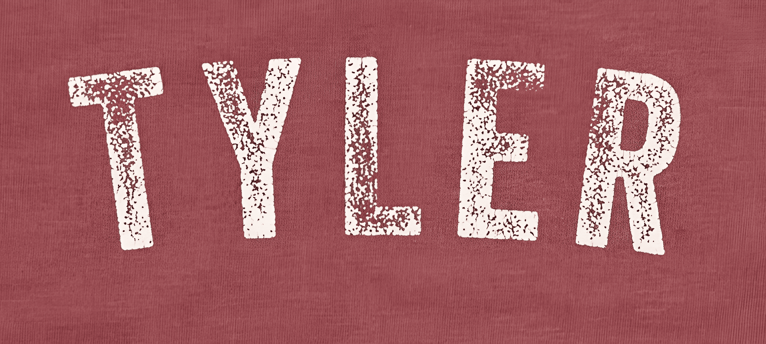 Upscale Distressed 'TYLER' Text on Fabric | AI Image Enhancer